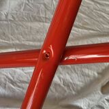 Vintage folding chair in red painted metal and wood