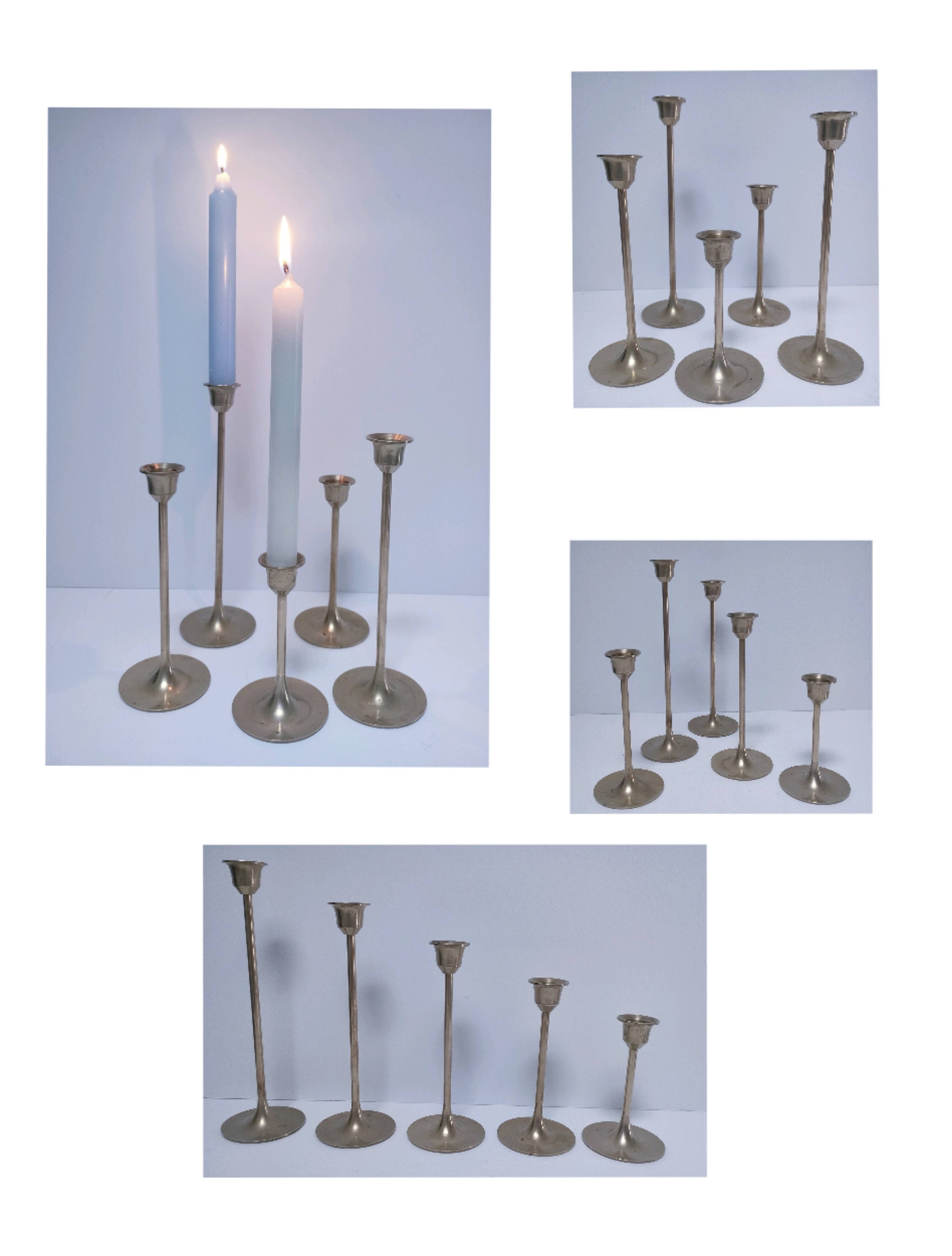 Five vintage Scandinavian design brass candlesticks