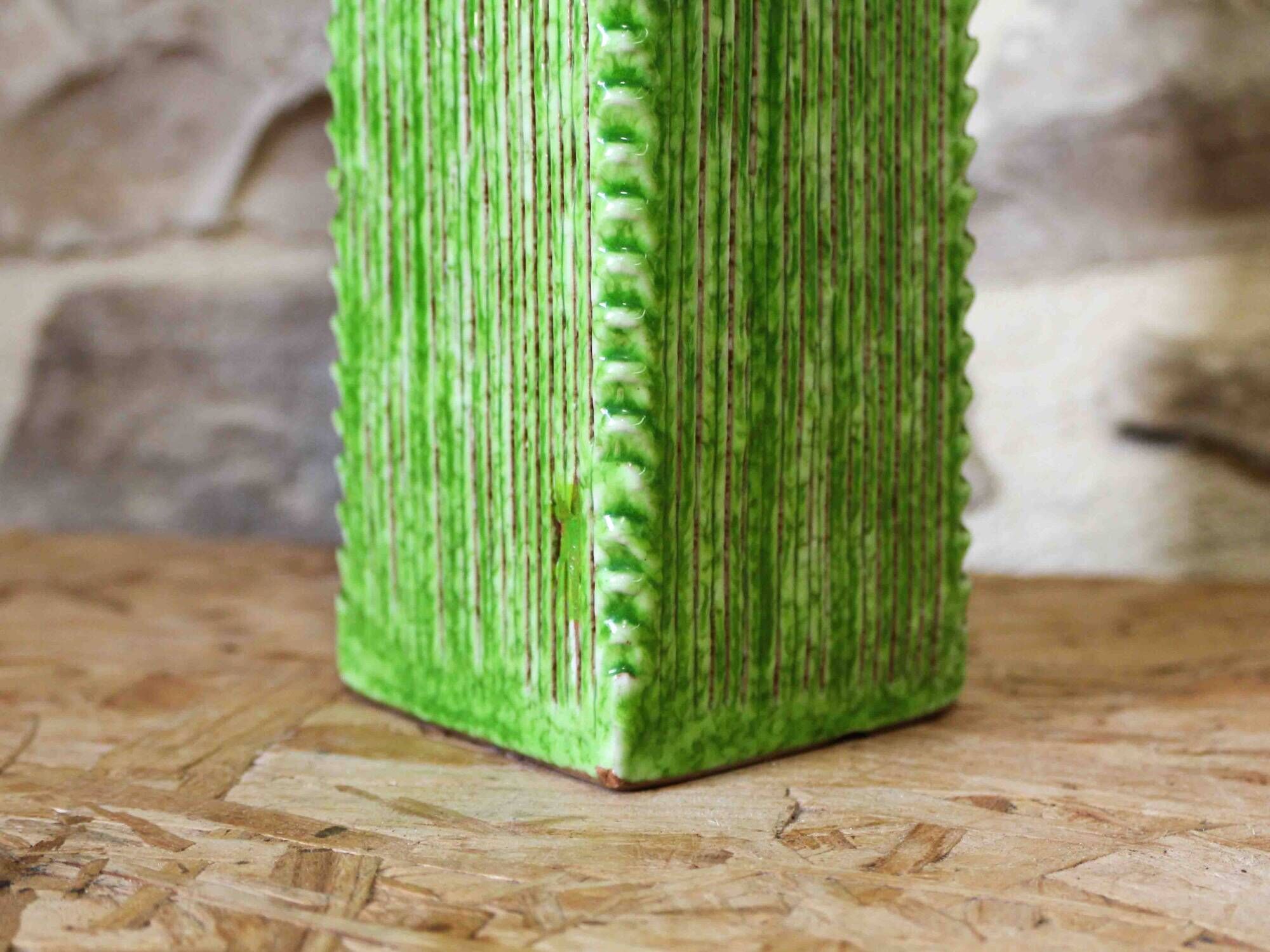 Incised ceramic vase with a square section