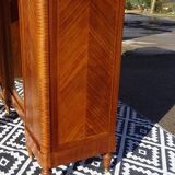 Louis XVI armoire with marquetry and gilded bronze