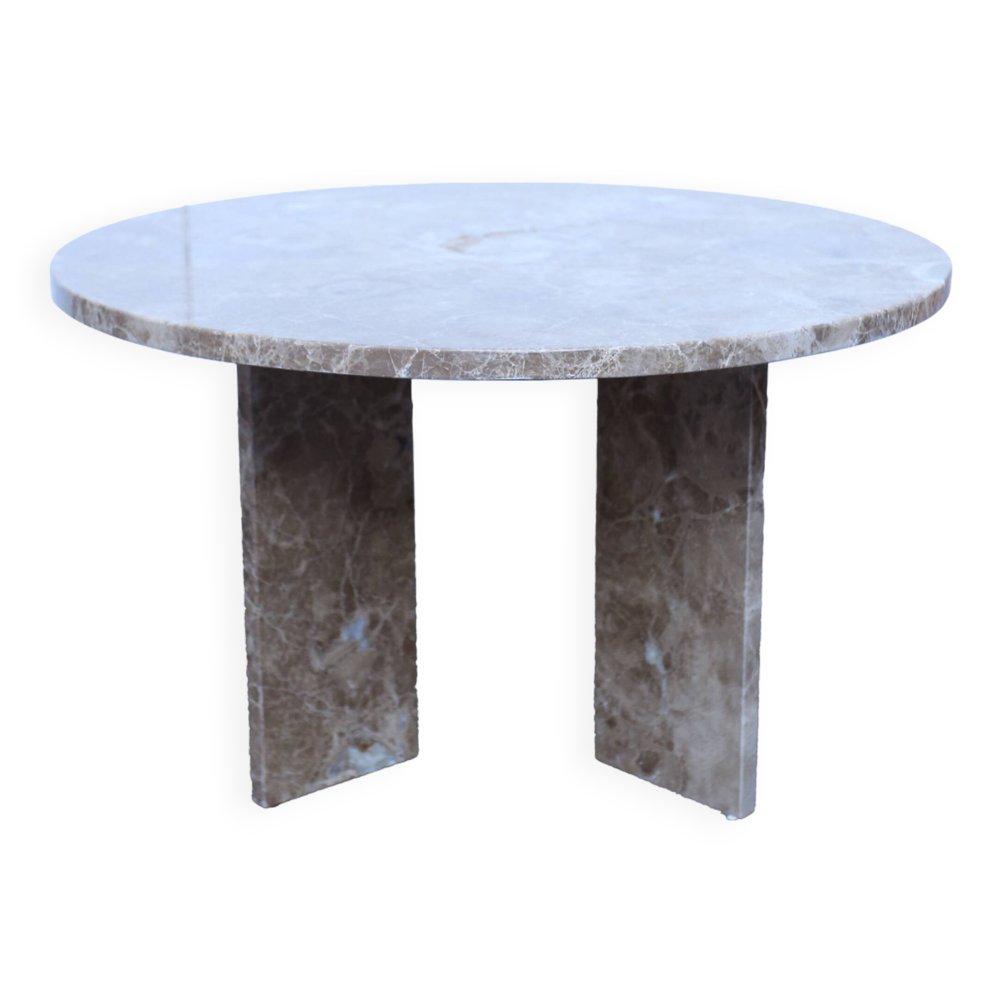 Round table in beige marble