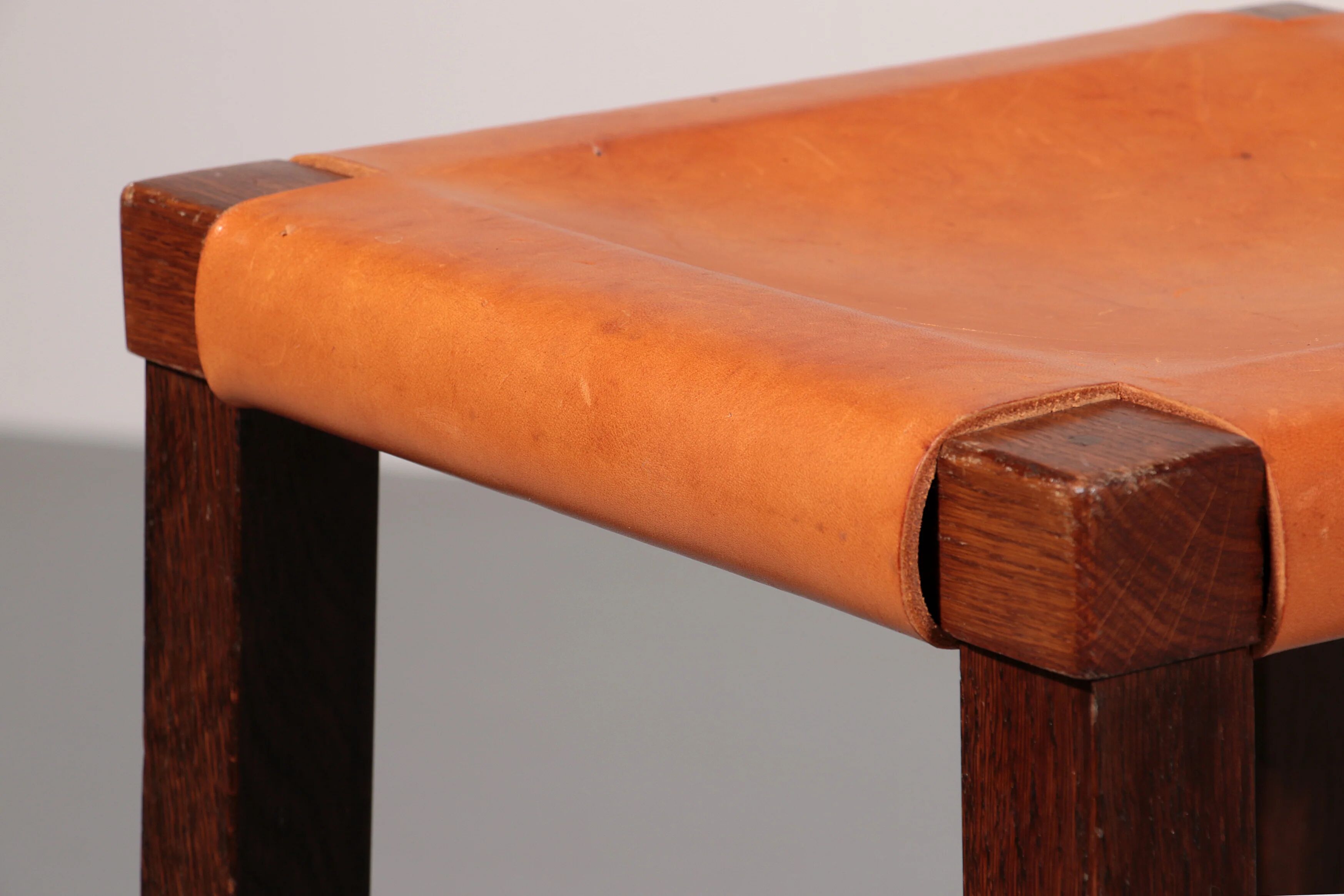 Mid-century oak bar stools with cognac leather seats