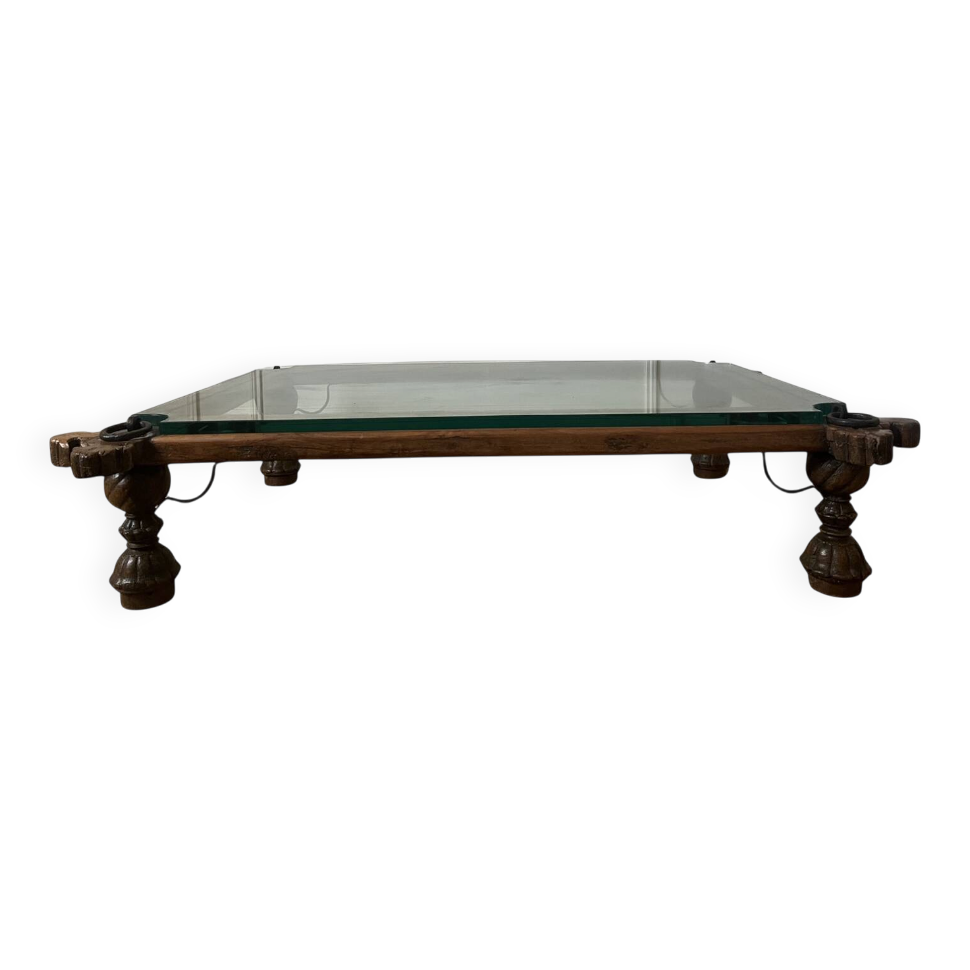 Indian coffee table made of wood and wrought iron.
