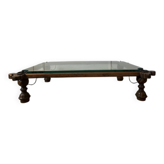 Indian coffee table made of wood and wrought iron.