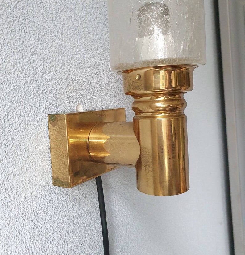 Brass applique with 1970 glass lampshade