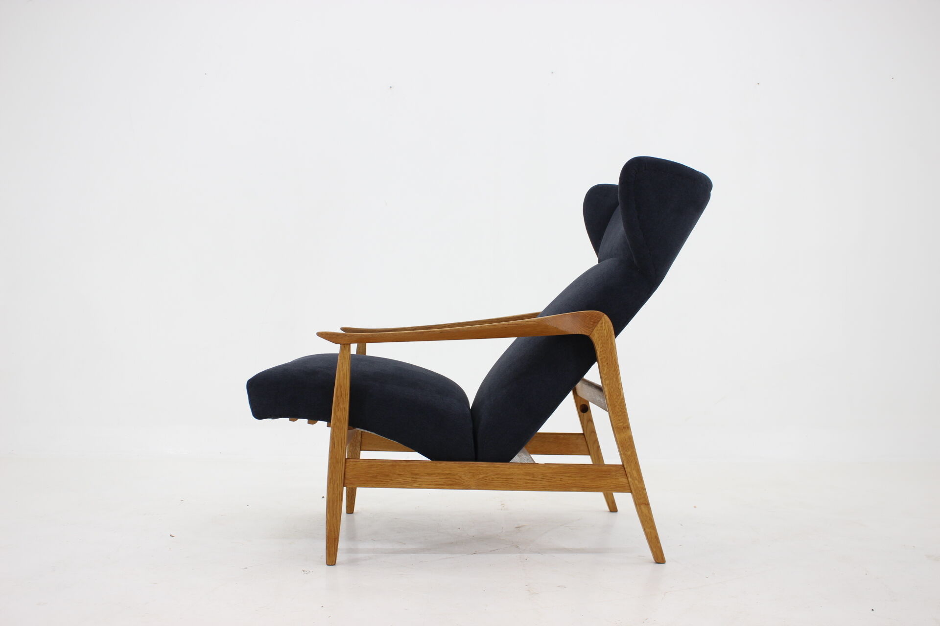 Oak reclining wing chair, czechoslovakia, 1960