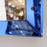 Mirror with a coloured glass frame attributed to Fontana Arte, Italy, circa 1950.