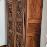 Carved cherubs cabinet