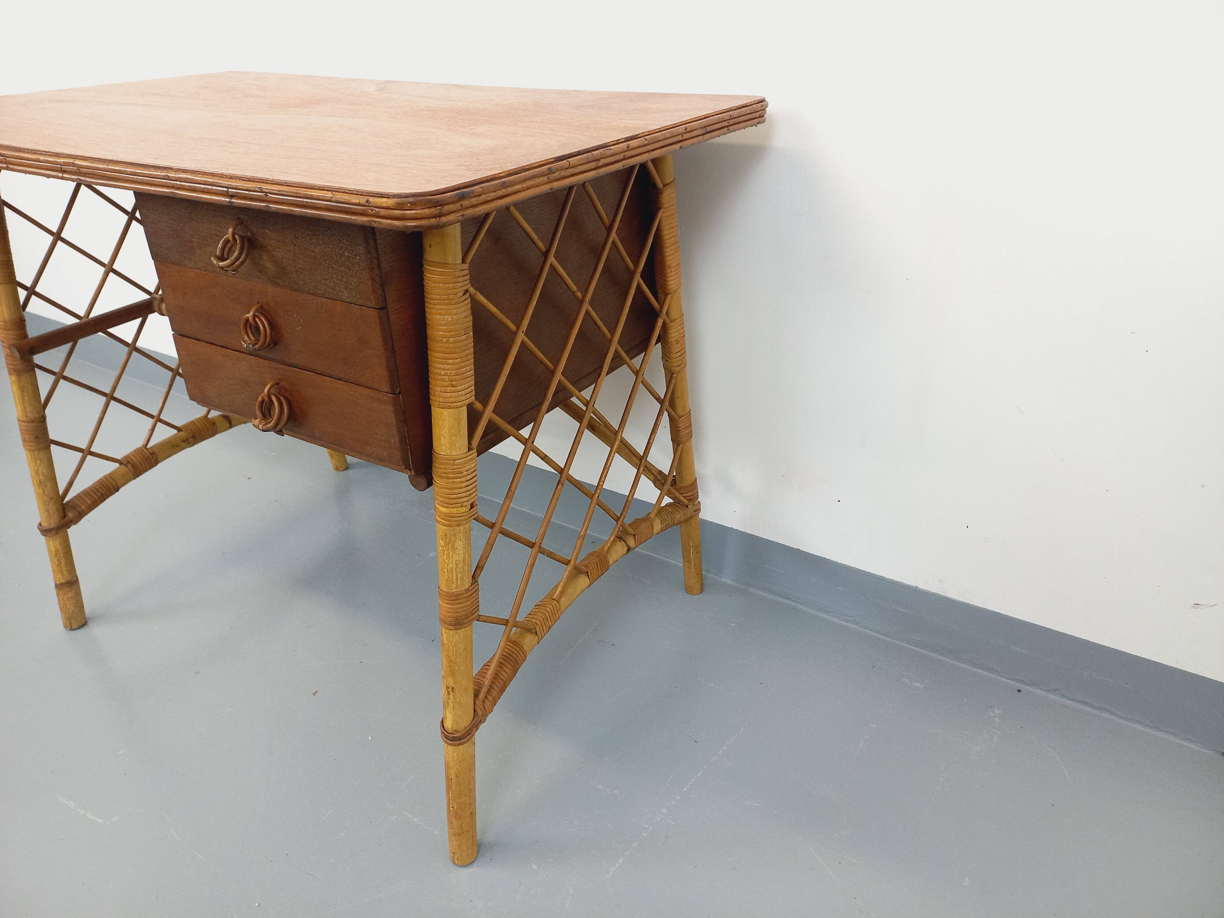 Vintage Louis Sognot desk in rattan and wood from the 1960s