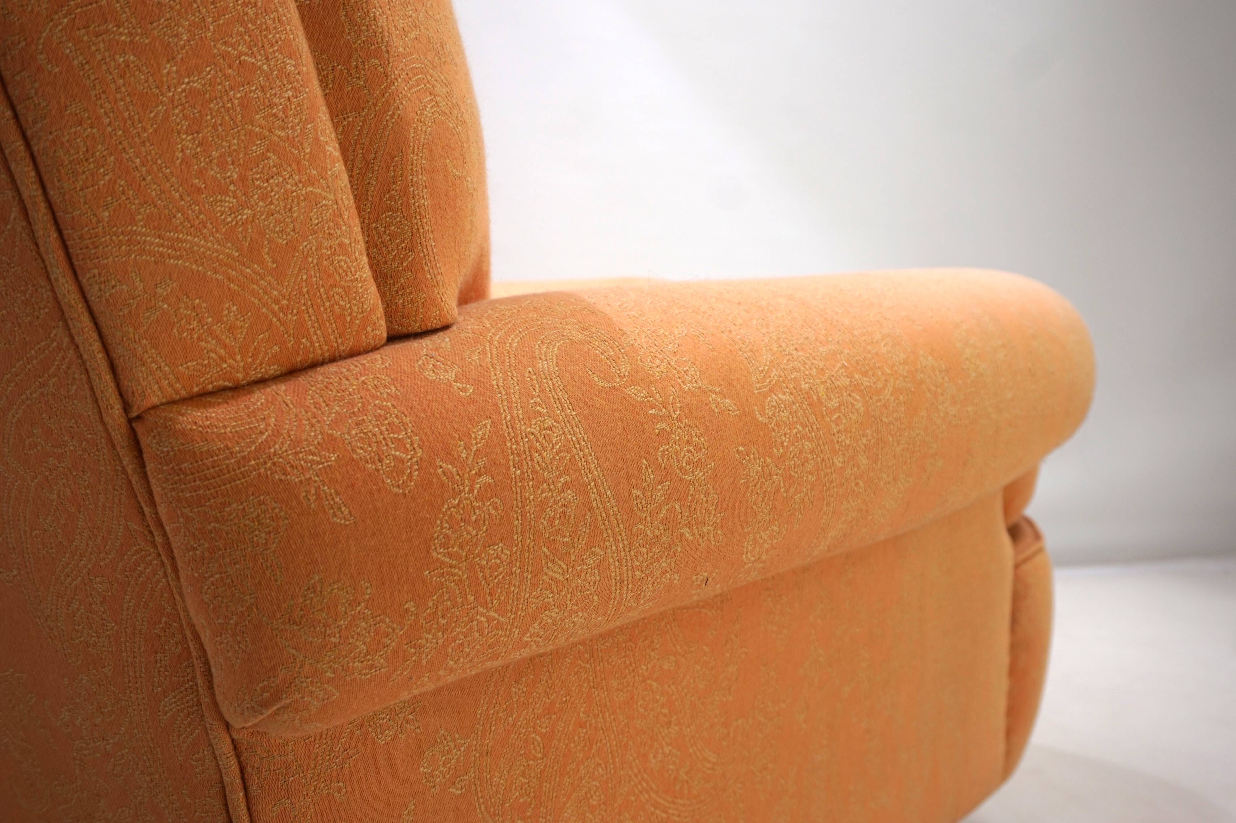 Deep seated armchair in the style of Howard & Sons