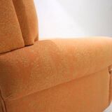 Deep seated armchair in the style of Howard & Sons