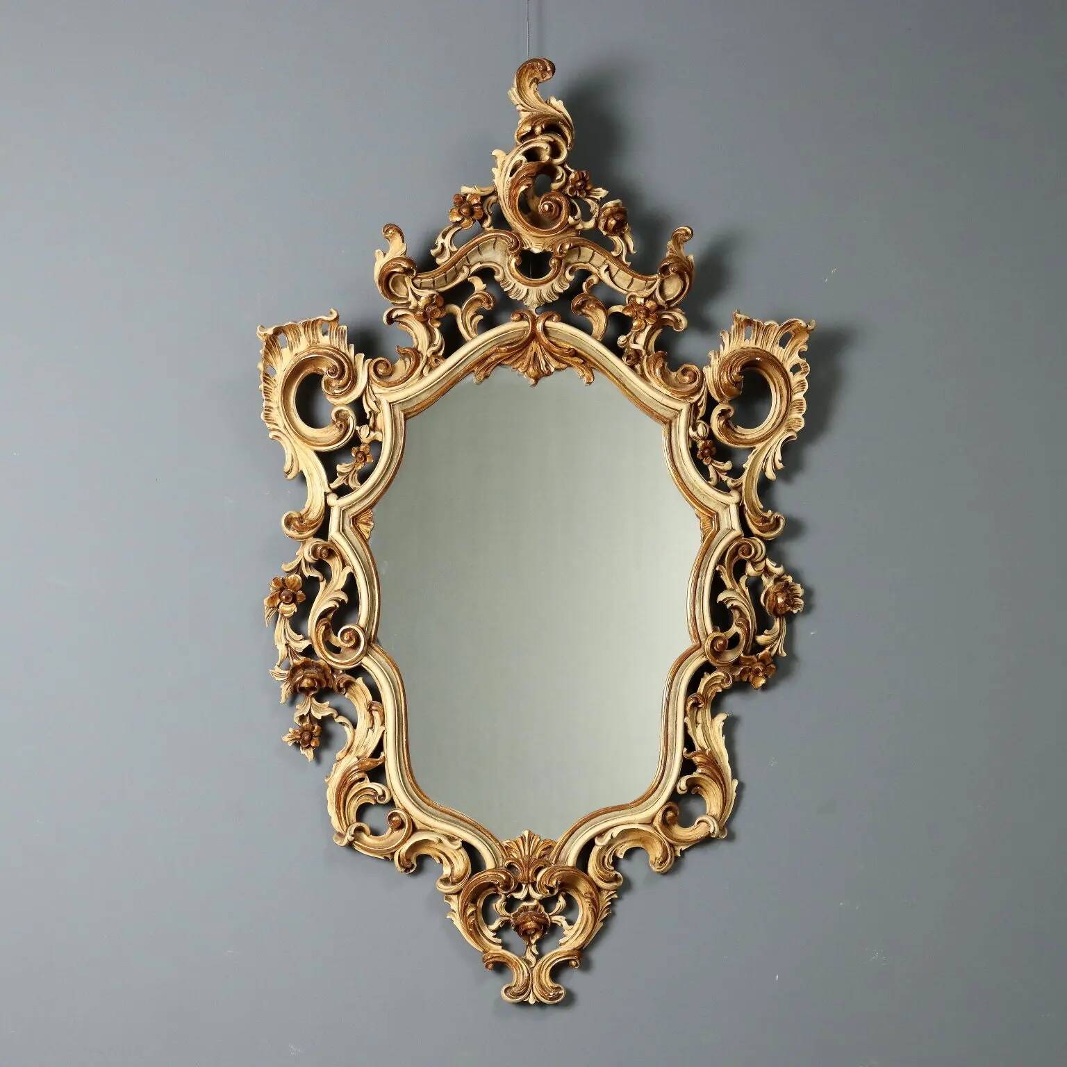 Antique lacquered and gilded wooden mirror, Italy, early 20th century.