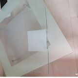 Coffee table in frosted glass and chrome metal