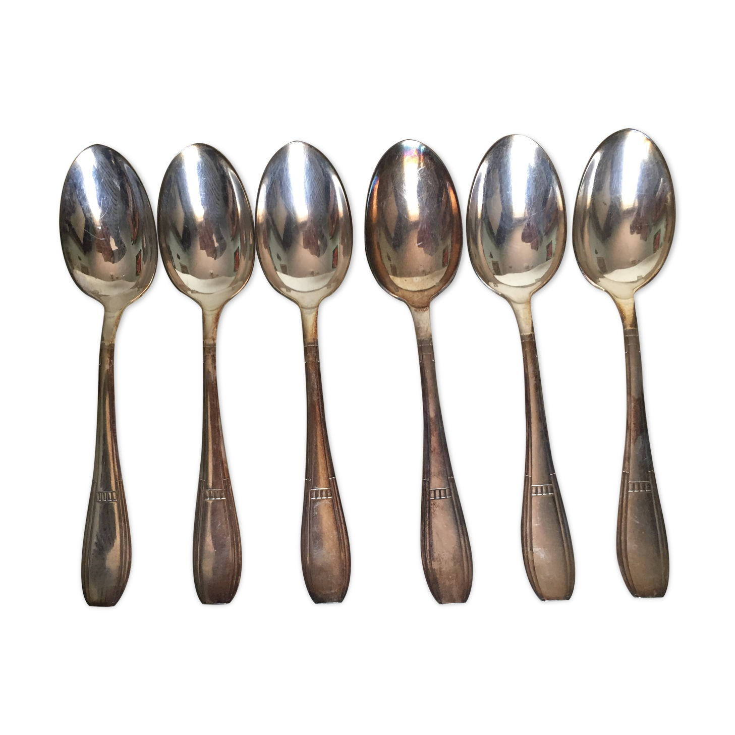 Set of six teaspoons of silver metal