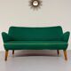 Old vintage green cocktail bean sofa from the 50s