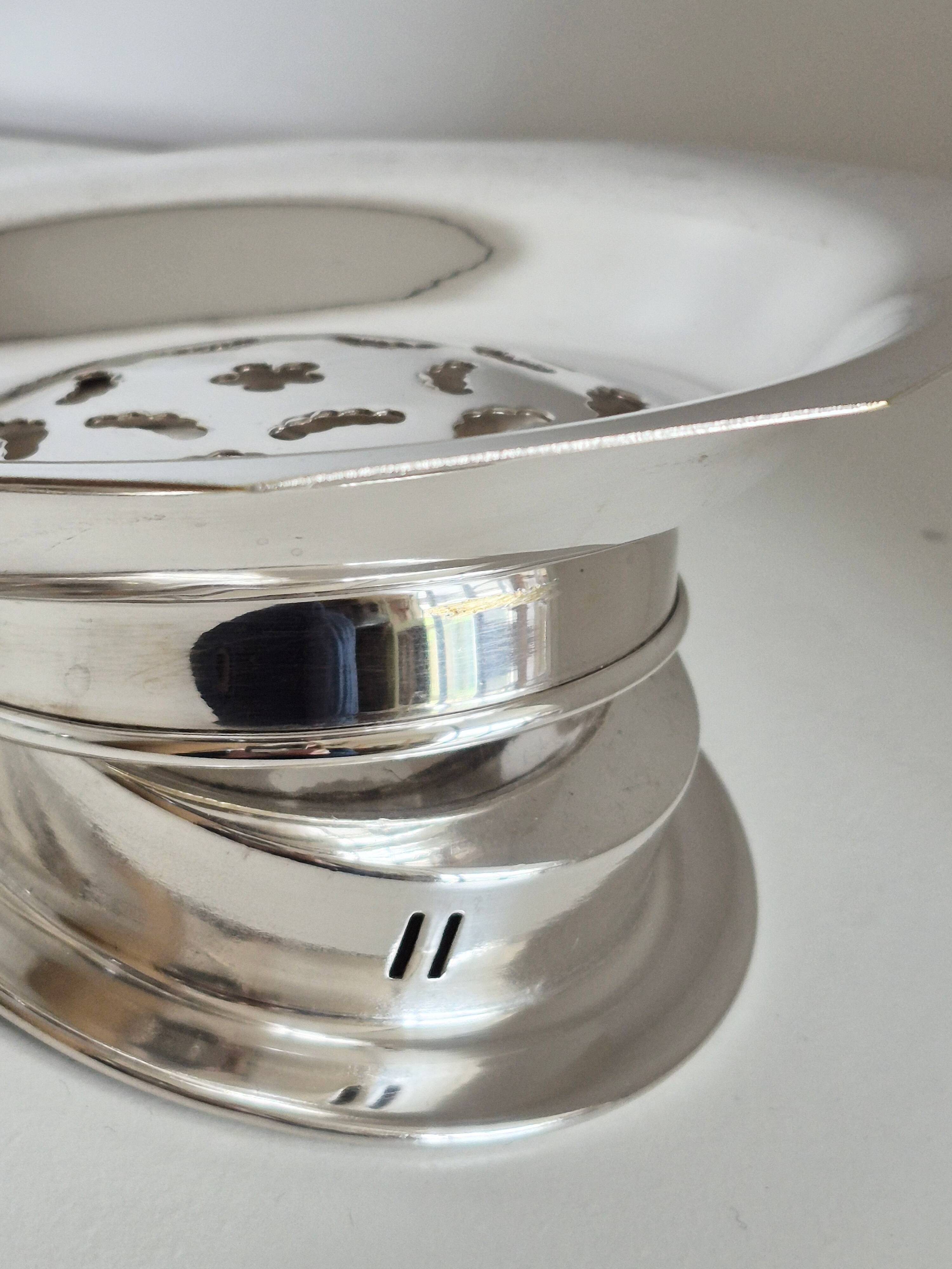 Antique butter dish in the Coquillor style, made of silver-plated metal.