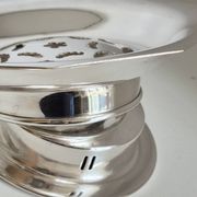 Antique butter dish in the Coquillor style, made of silver-plated metal.