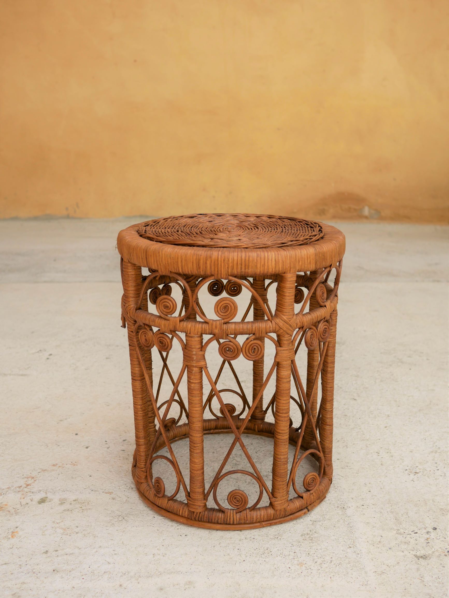 Vintage peacock stool in rattan