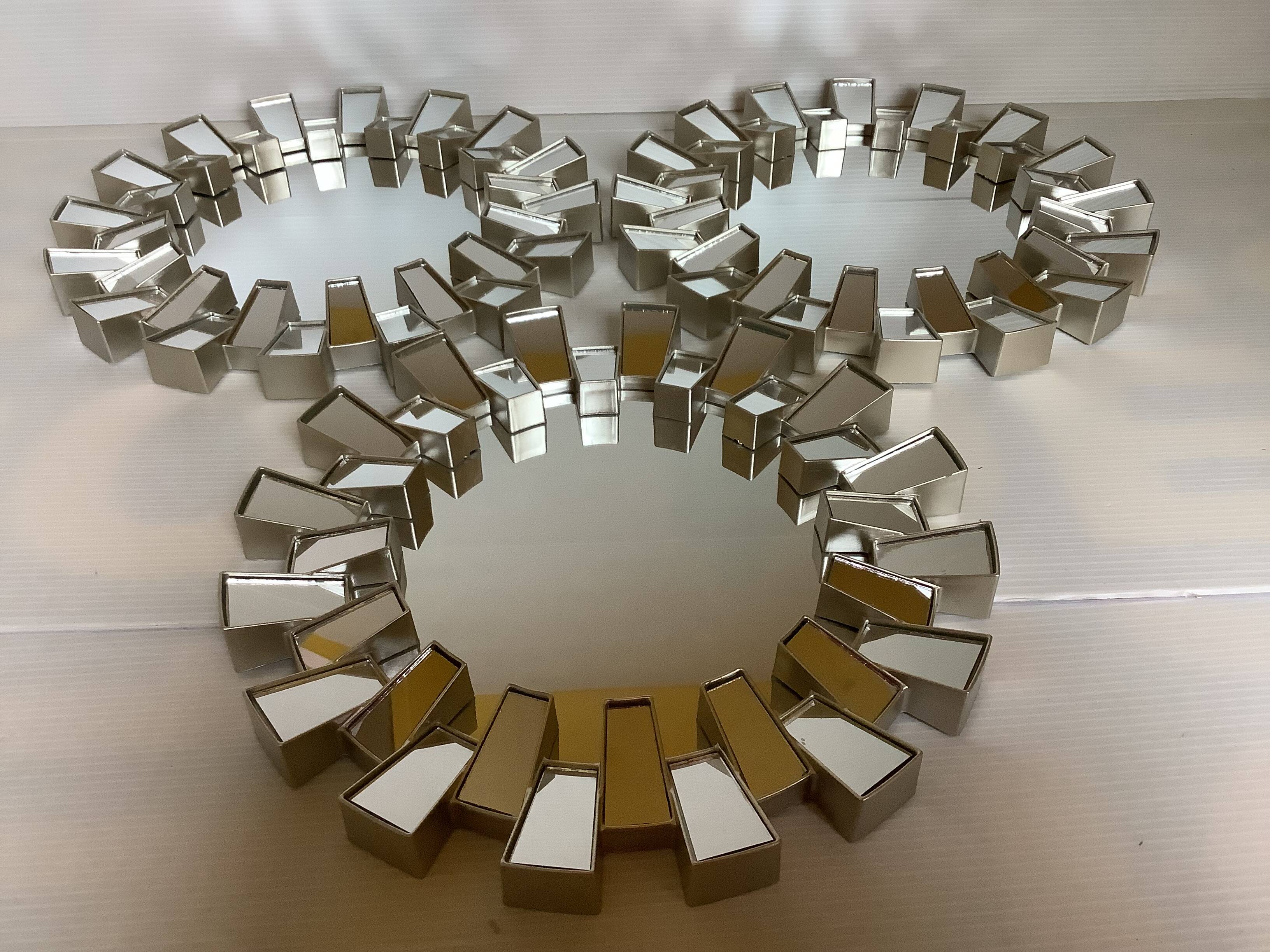 Trio of silver-framed mirrors