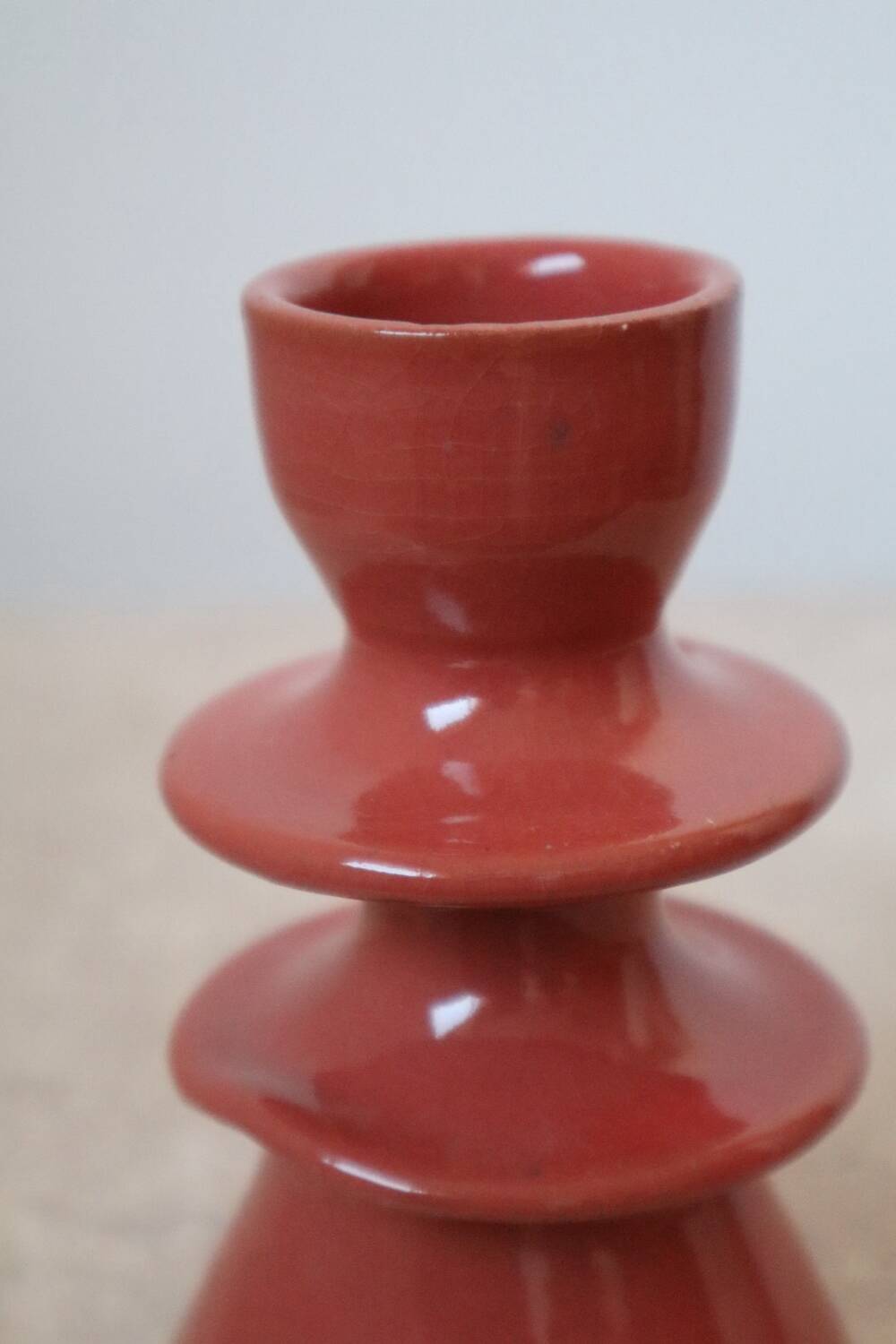 Dark pink ceramic candlestick