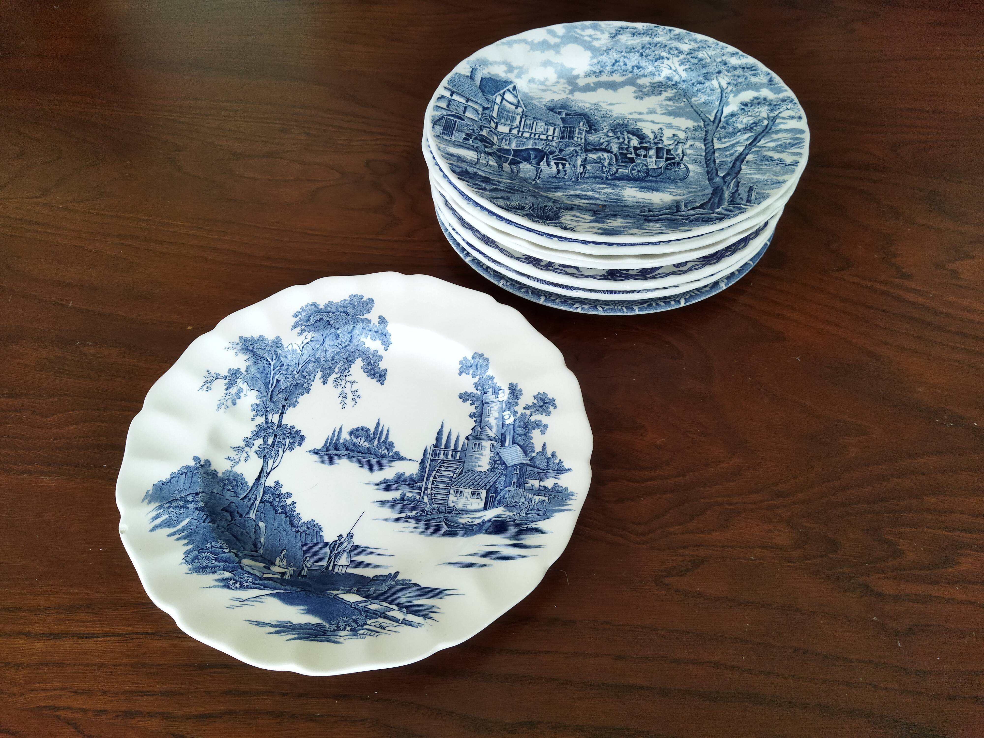 8 blue & white plates