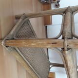 On feet vintage rattan shelf