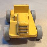 Yellow wooden tractor, antique toy