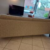 Duvivier canapé 104 Mayenne Alaska pebble fabric and its headrests.