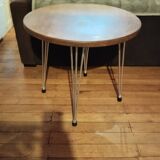 Round side table serving Eiffel leg oak top