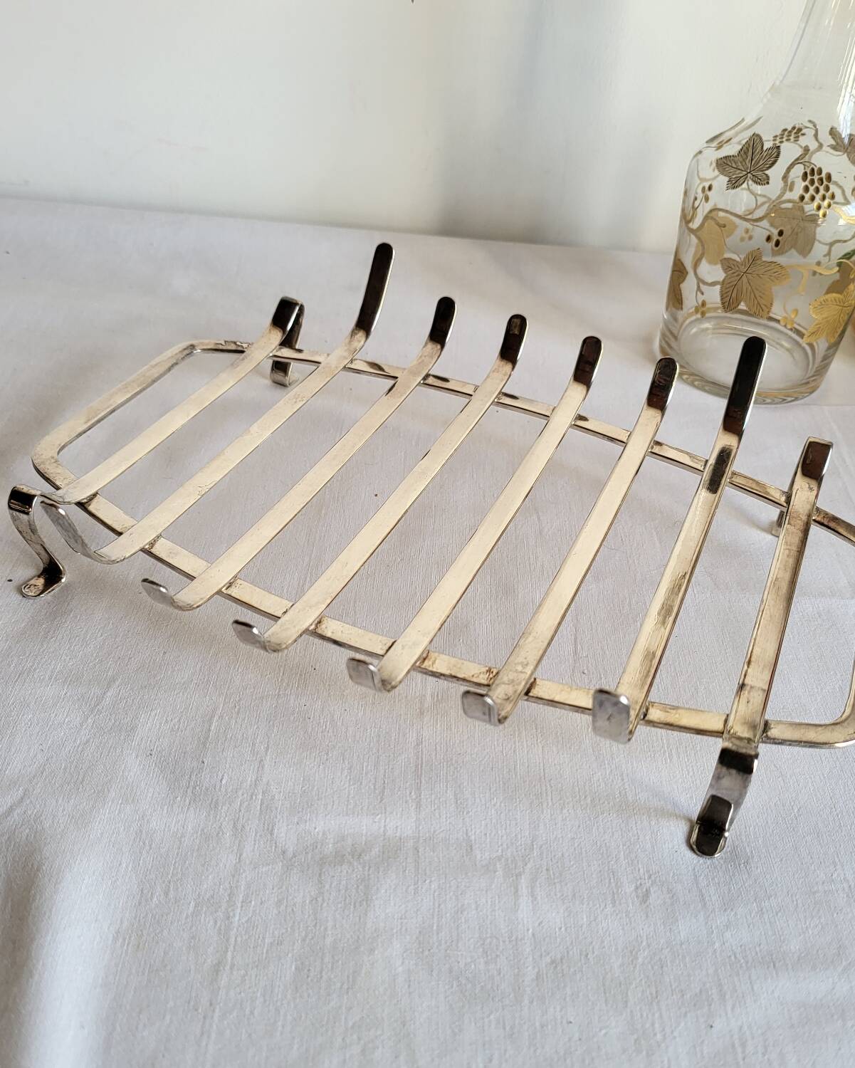 Silver-plated serving dish Quist and its asparagus cradle grid.