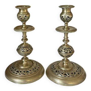 pair of openwork gilded brass candlesticks from the 19th century