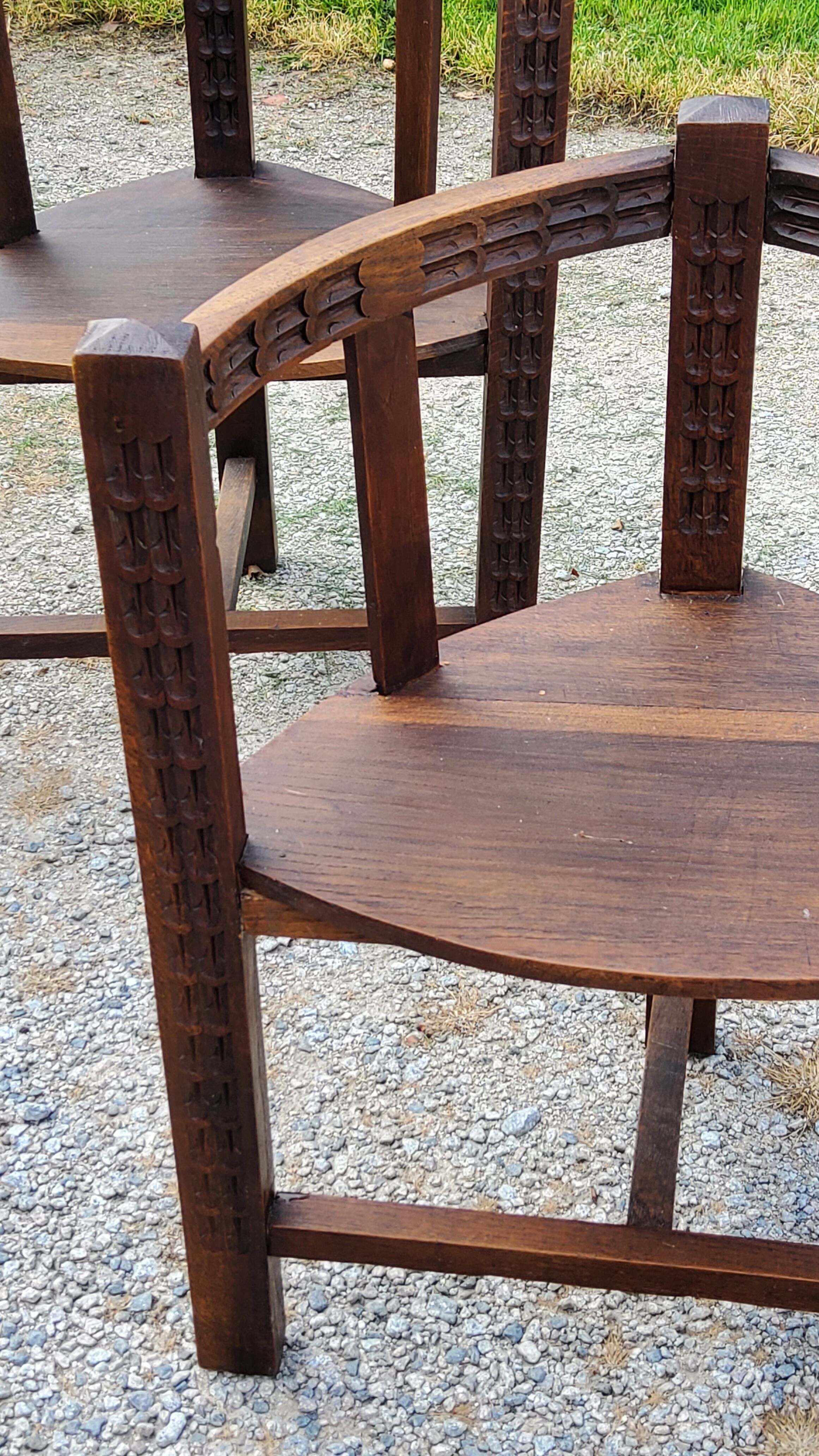 Set of three brutalist tripod armchairs in carved solid oak