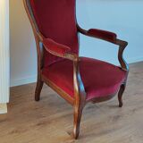 Red voltaire armchair