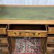 English flat desk with drawers from the 1970s in fir and leather top.