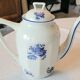 Blue and white ceramic coffee service with vintage flowers.