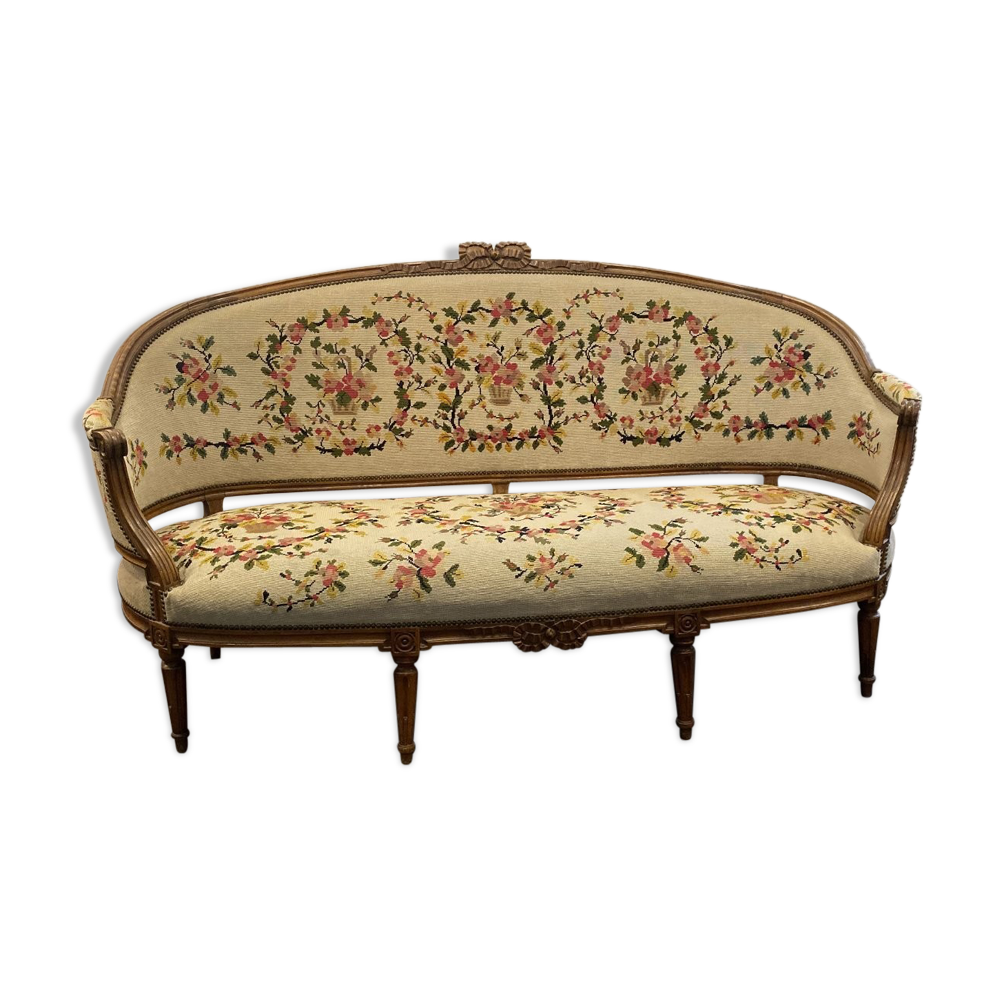 Sofa in walnut with basket shape from the Louis XVI period circa 1780