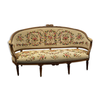 Sofa in walnut with basket shape from the Louis XVI period circa 1780