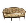 Sofa in walnut with basket shape from the Louis XVI period circa 1780