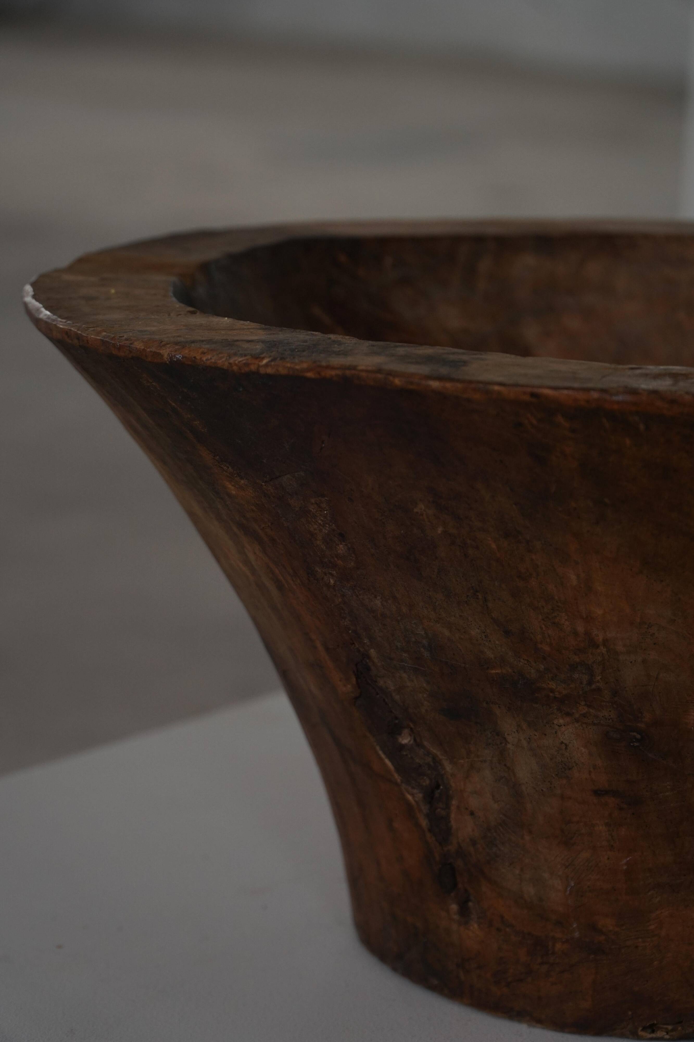 Large hand-carved African wooden bowl, mid-20th century.