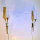 Pair of tall brass and white opaline sconces, mid-century France