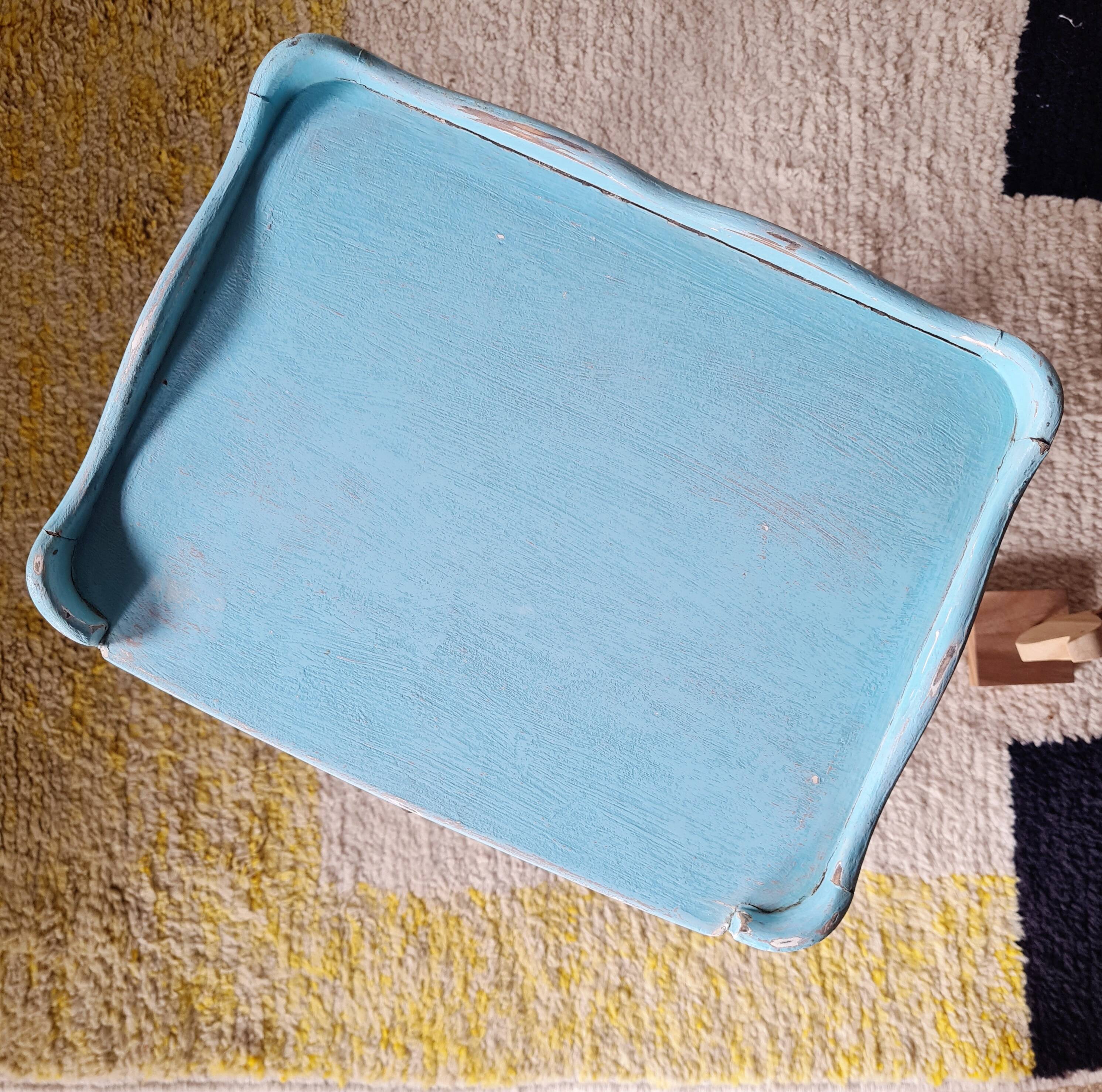 Small vintage bedside table in azure blue patina.