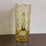 Pitcher in crumpled glass