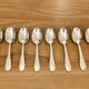 Set of 10 small silver metal spoons
