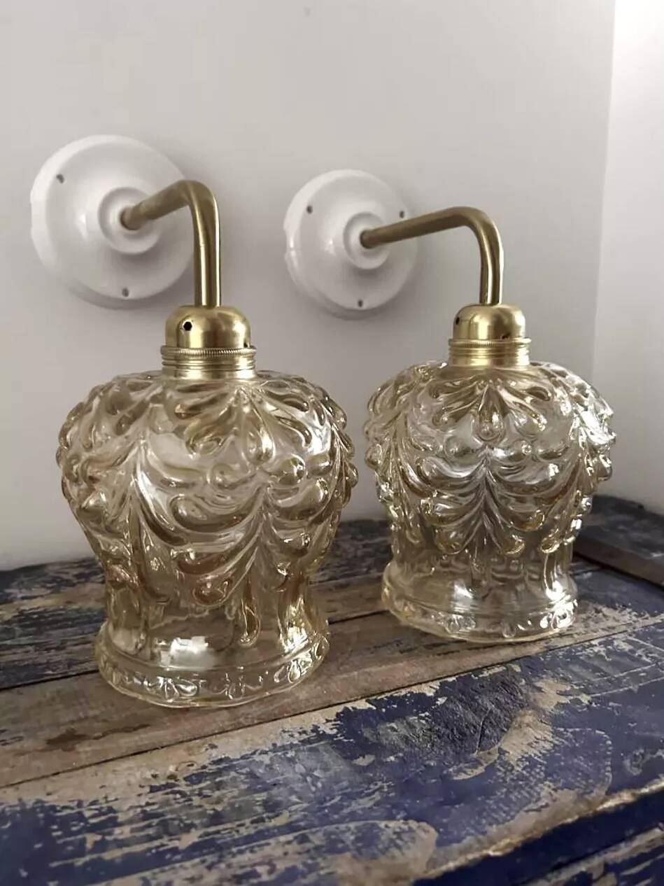 Pair of gold wall sconces