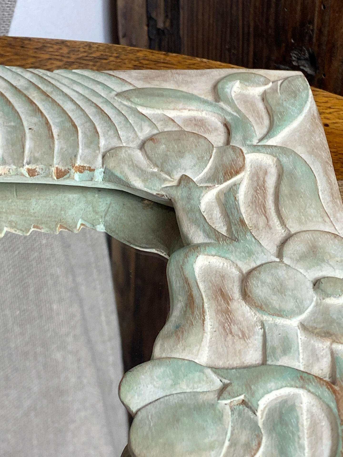 Carved wooden mirror