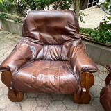 2 Brutalist armchairs in wood and leather 1970