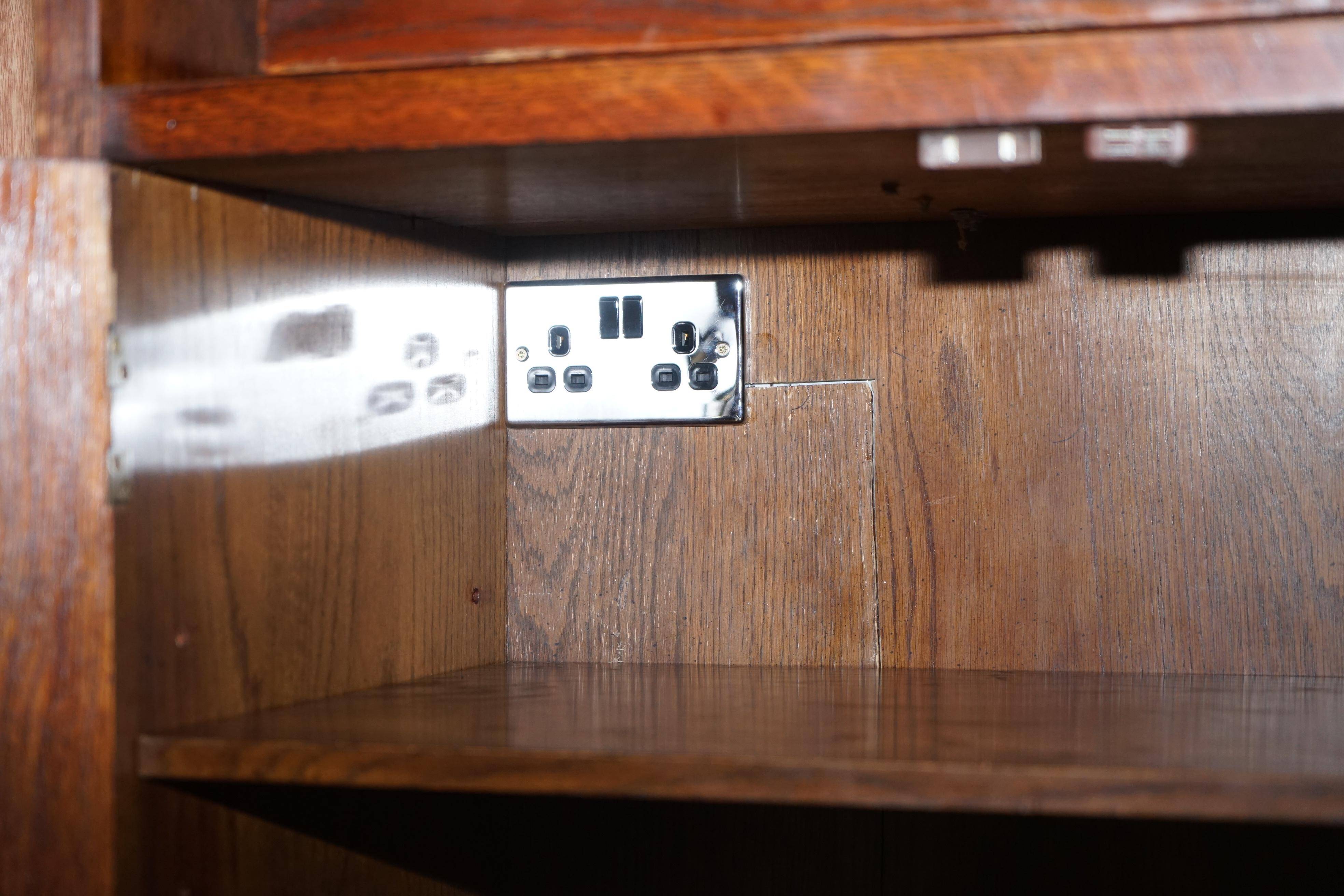 Henredon multimedia furniture military campaign with sliding TV stand and double socket.