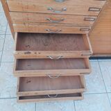 Workshop furniture with drawers and curtain in beech and walnut.