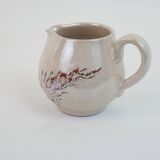 Pair of ceramic milk jugs signed La Roue Vallauris