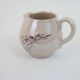 Pair of ceramic milk jugs signed La Roue Vallauris